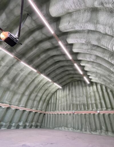 Spray Foam Insulation installed in a Large Industrial Space. Shop with well coated insulation.
