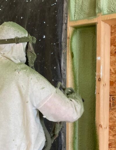 Spray Foam being applied to the inside of a wall. Professional spray foaming solutions.