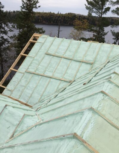 Spray Foam Insolation Installed on a framed roof.